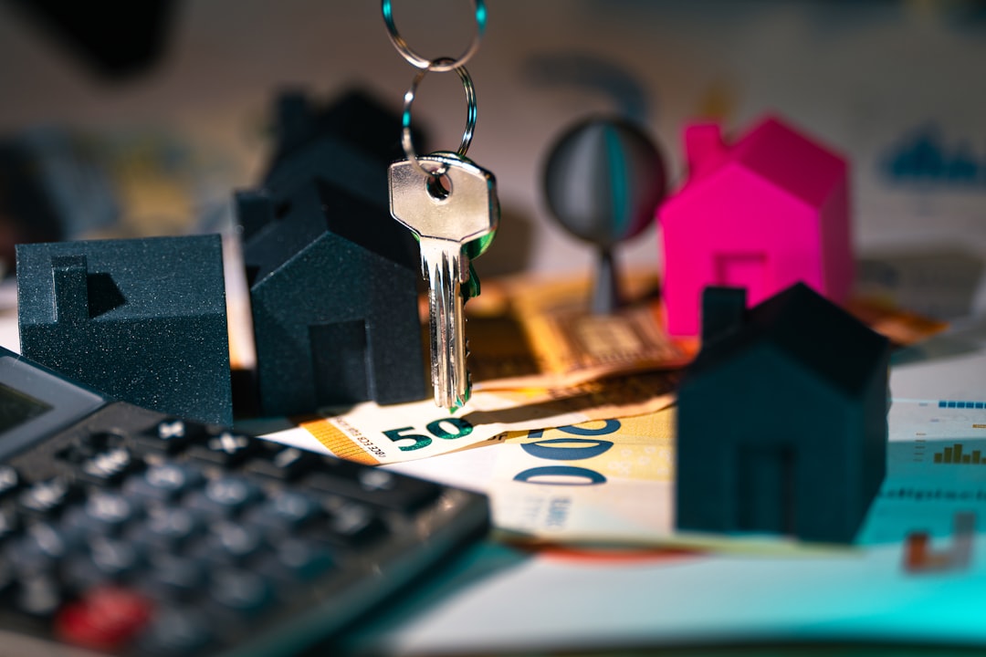 Real estate agent using AI tools on laptop and tablet