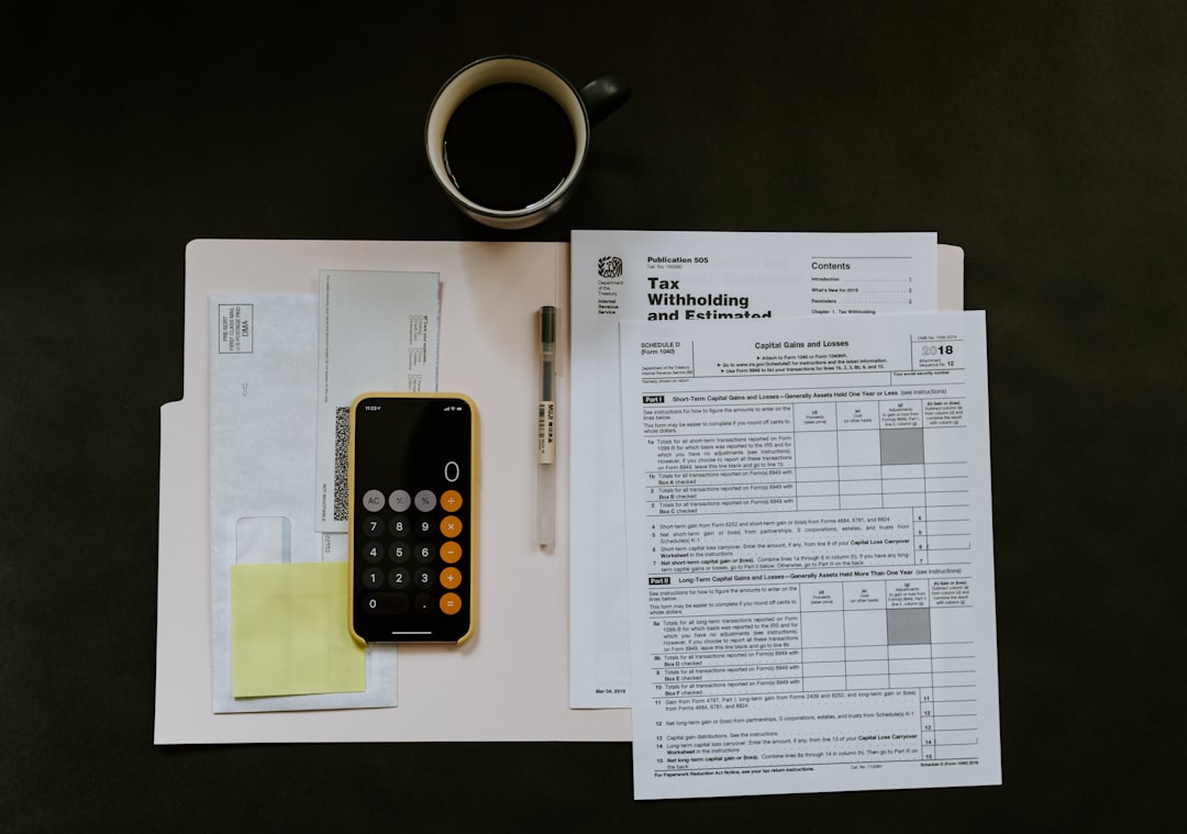 Freelancer automating invoicing on laptop with billing dashboard open